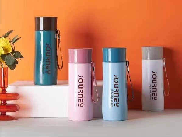 School bottle, glass inner with silicon outer