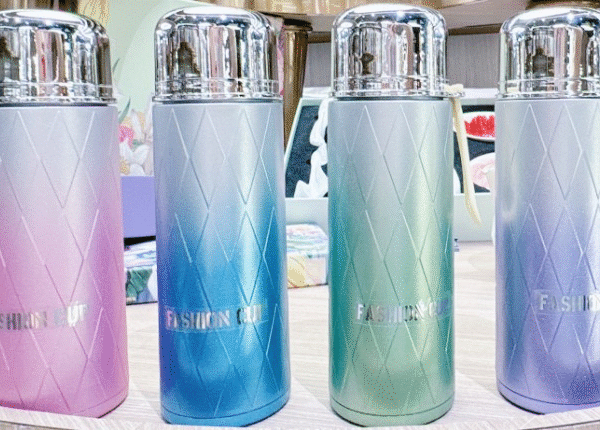 School bottle, glass inner with silicon outercover